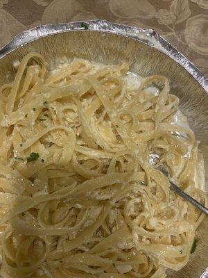 This is supposed to be their fettuccini Alfredo, freshly made by the way. An oily congealed mess. It was awful and inedible.