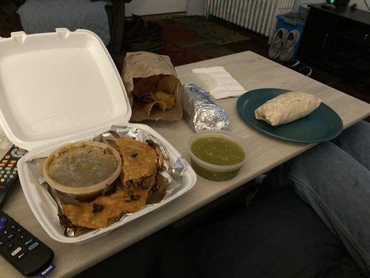 (Left to right) Birria Quesadilla, Chips and Salsa, Chicken Burrito, and Al Pastor Burrito