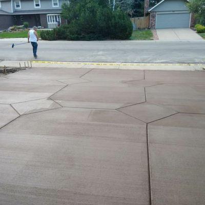 Colored Concrete driveway with a Diamond pattern. Custom Color and Custom Pattern per request.
720-758-0376