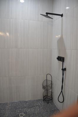 Full bath with beautiful tile shower