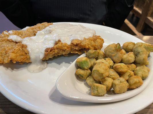 Chicken fried steak with white gravy and okra