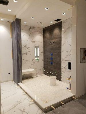 Custom Bathroom in progress with Azul Macauba vertical wall.