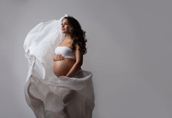 Specializing in capturing the marvelous journey of Motherhood.