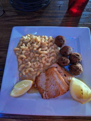 Salmon, buttered, with Jalapeño hush puppies and Cajun mac'n'cheese.