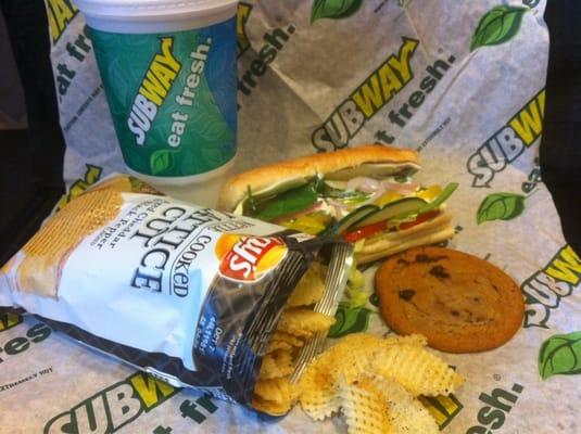 Cold cut combo, cheddar & black pepper lattice cut chips, and a chocolate chip cookie