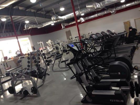 Big workout area with lots of machines