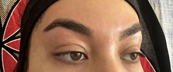 Eyebrow wax and shape