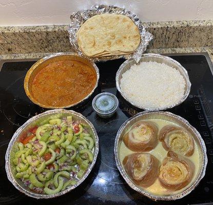 Chicken tikka masala. Jasmine rice. Garlic naan. Mint cucumber salad. And. Orange rolls with vanilla glaze