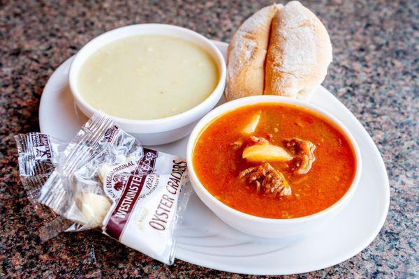 Cup of beef stew and Greek chicken lemon soup