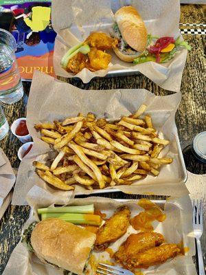 Shared order of Philly roast pork sandwich, Buffalo wings, & large fries. All were delicious!