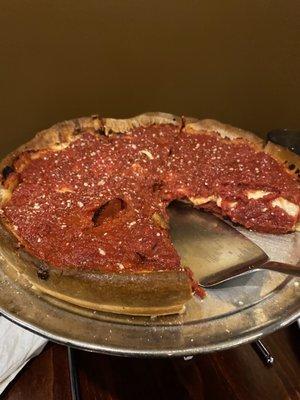 Deep dish Chicago style THIS IS A MEDIUM it is so hearty a few slices will take you out