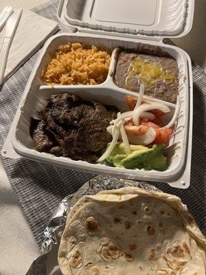 Carne asada plate with flour tortillas