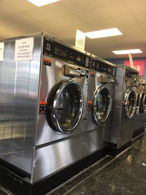 All different size washers and dryers.