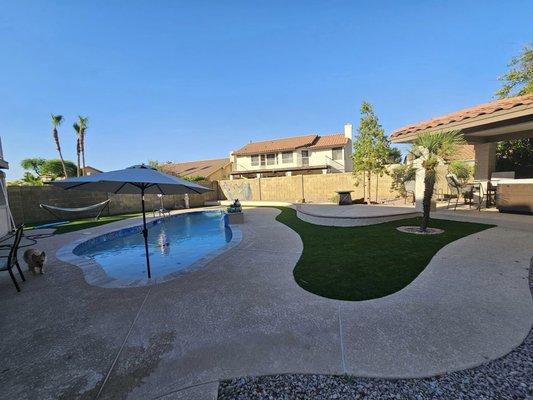 Beautiful new terf and cool decking. Henry's crew also completed the full pool remodel a few years ago.