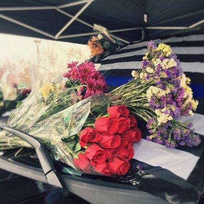 Flowers for Officer Collin Rose. May you Rest In Peace. Thank you for your service that keeps us safe everyday.