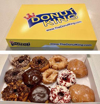 A dozen varied donuts.