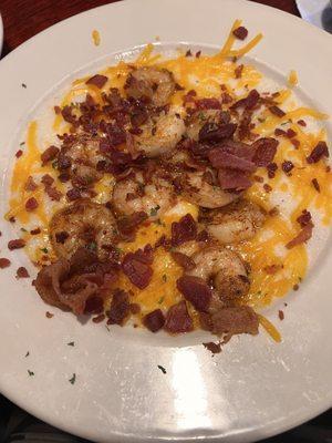 Shrimp & Cheese grits topped with bacon