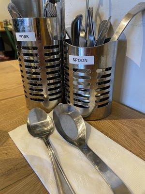 Metal utensils at the table