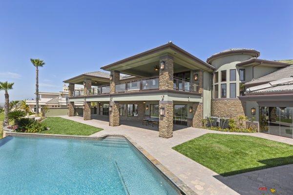 Beautiful backyard of a 9000 Sq. Ft. residence designed by Omega Design Group