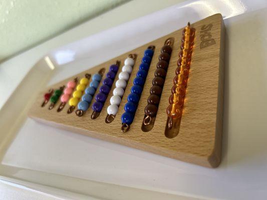 Montessori bead stairs for math.