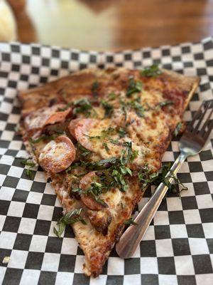 Slice with Canadian bacon, meatball, and fresh basil