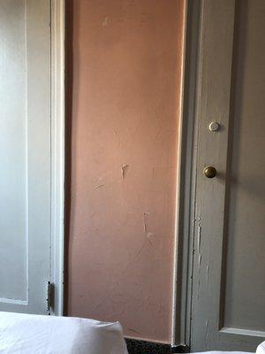 Peeling paint on all the walls. Not just one spot -- peeling everywhere, top to bottom.