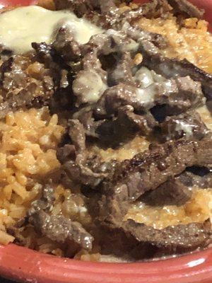 Steak and cheesy rice