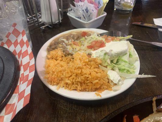 Side of rice, beans, and sour cream.