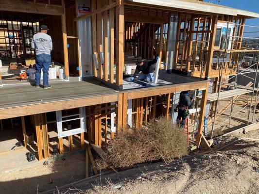 Deck and bathroom waterproofing at new custom home