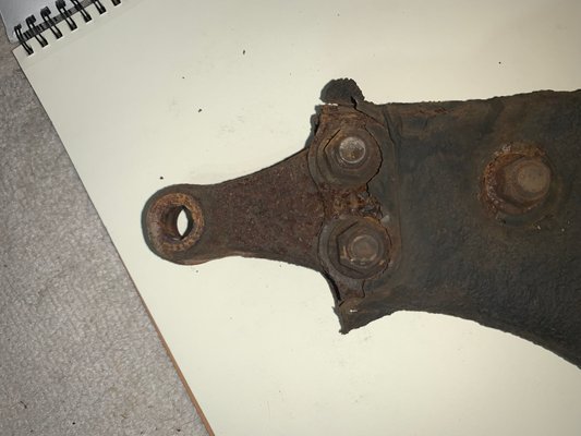 Corroded left lower control arm