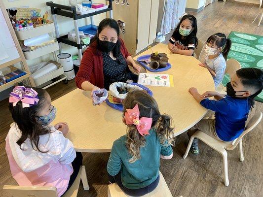 Pre-K learning about planting