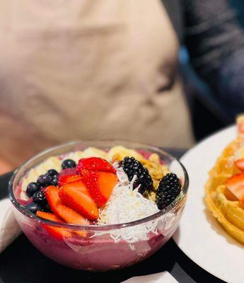 Açaí bowl served with fresh fruit, granola, coconut and honey!