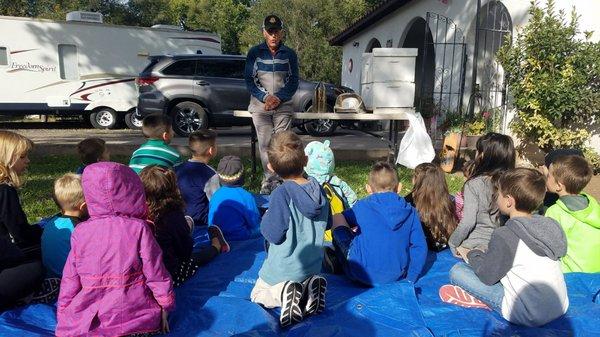 Homeschool. Mr. Hays passong on his valuable bee knowledge.