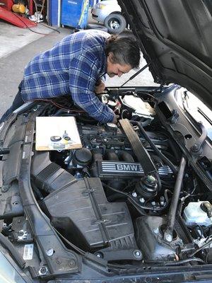 Our diagnostic wiz working on a BMW