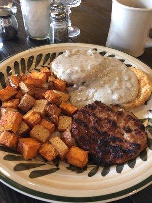 Home fries, Biscuits and gravy and sausage on the side, good old fashioned stick to your ribs food.