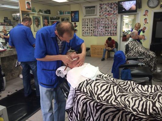 Mike doing a hot towel shave