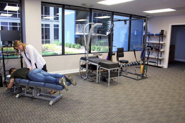 Treatment Area with Dr. Dennis Performing a Mirror Image Adjustment