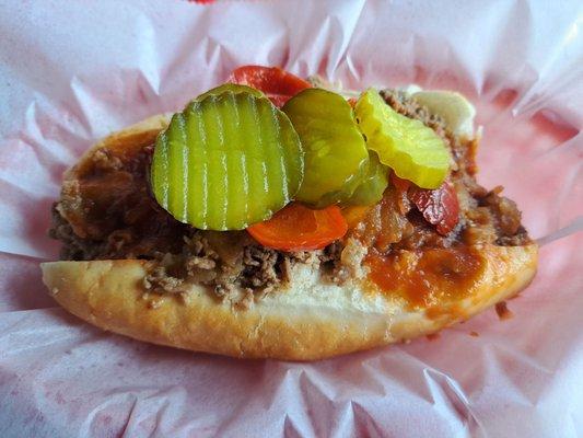 Cheesesteak with toppings.