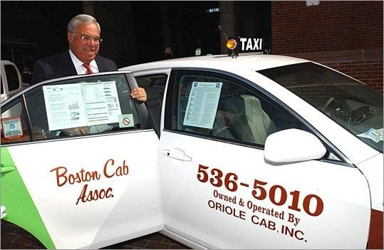 Boston's Mayor Thomas Menino, in 2006, steps into a Toyota Camry Hybrid owned by Boston Cab.