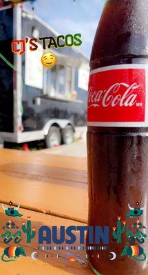 Are you really having Mexican without a medio litro of Coca-Cola en una botella de vidrio?