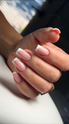 Nail extensions + French tip Includes: removing the old material, E-file dry manicure, nail shaping, cuticle cutting.