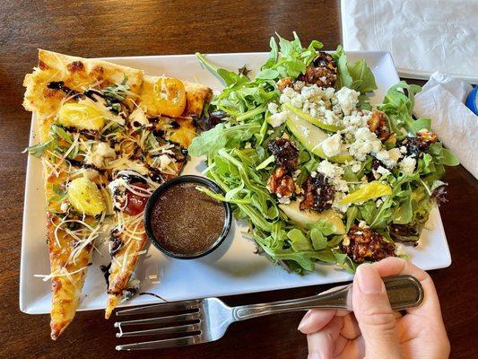 Lunch special with the pear, walnut, arugula salad. That's actually 1 slice cut in 2 for sharing. Great value with a sizable salad.