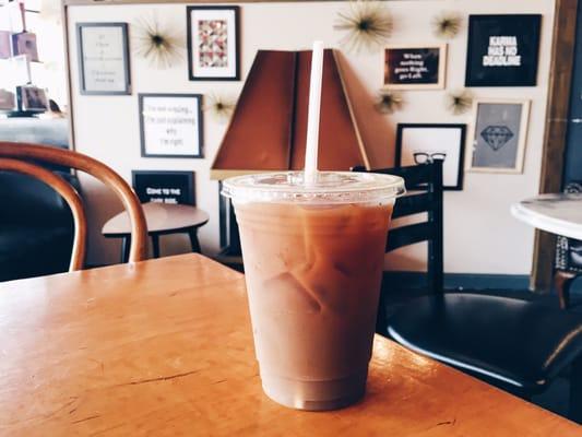 Iced coffee. Love the wall behind it.