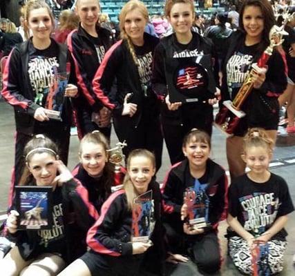 Courage Dance Team with their trophies and metals 2014.