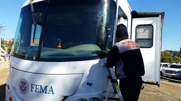 We repaired a leaking windshield on a FEMA vehicle.