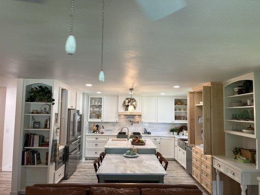 Full kitchen remodel, w custom built cabinets, quartz counters and full height quartz backsplash.