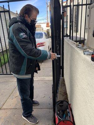 Rene working on front gate