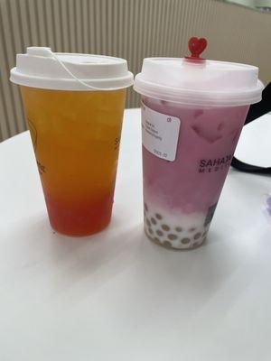 Pineapple fruit tea with strawberry boba and sakura milk tea with rose boba