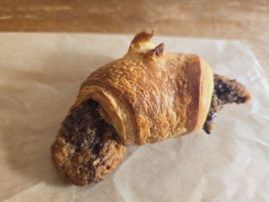 A crookie - housemade croissant wrapped around a chocolate chip cookie