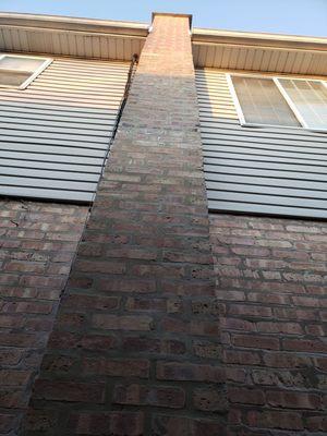 33 ft foundation to crown chimney tuckpointing.   Bricks replaced.  New chimney liner stainless steel installed